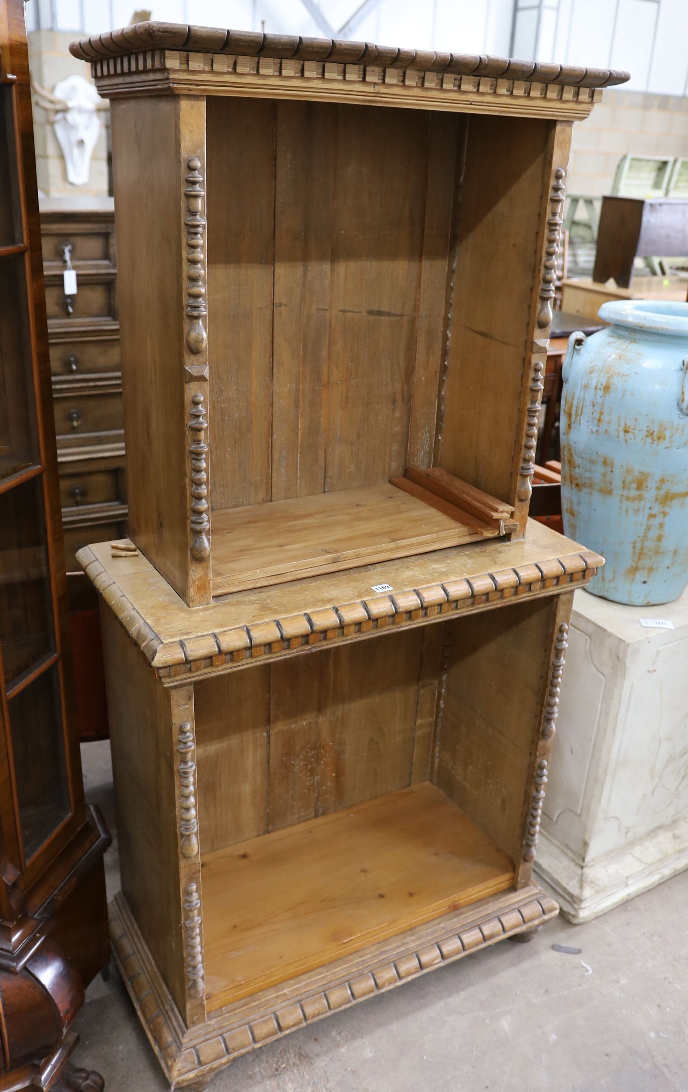 An early 20th century continental oak and pine two part open bookcase W 87 cm, D 42 cm, H 176 cm.